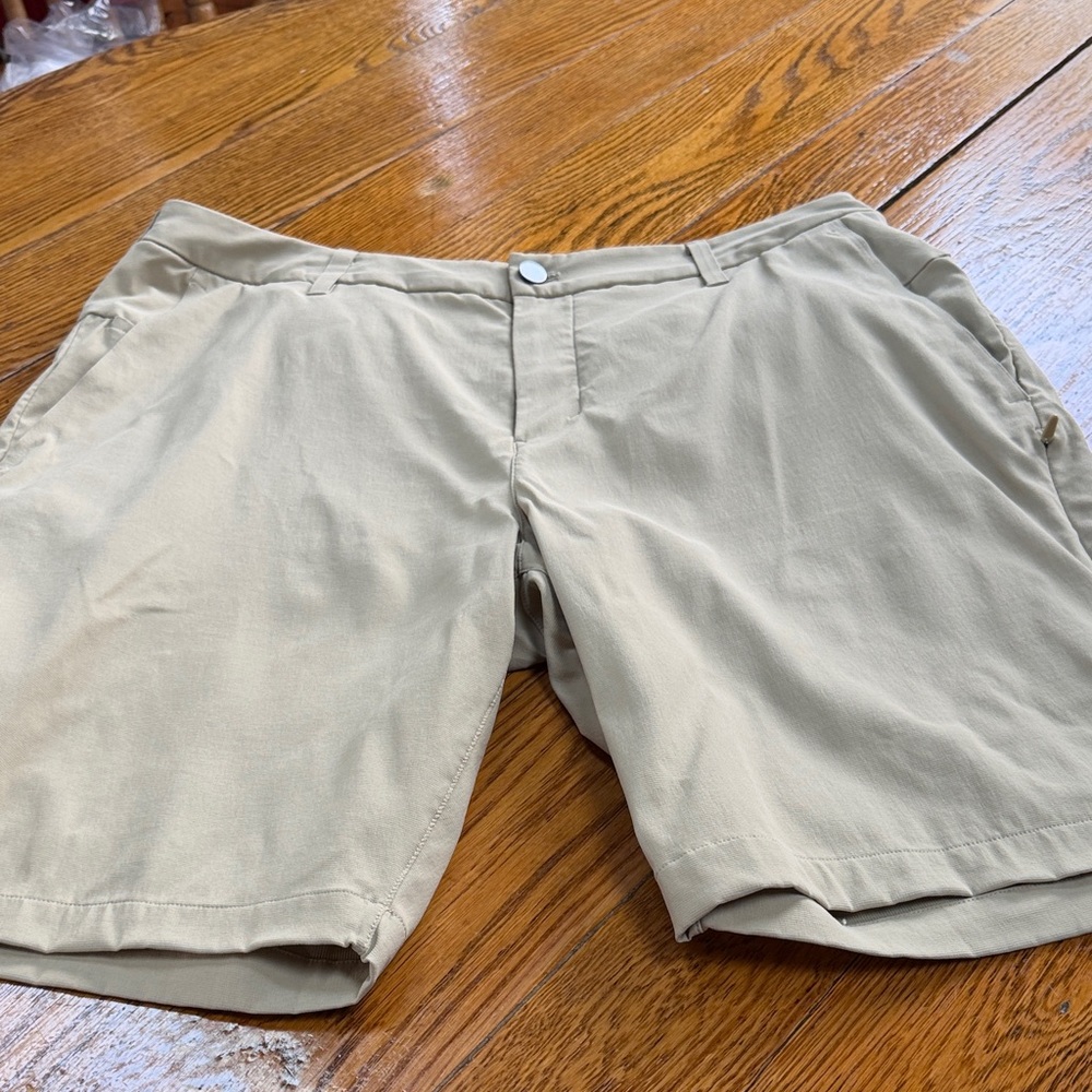Lululemon khaki men’s golf shorts.  Great condition.  Size 36.